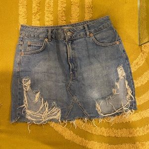 Distressed denim skirt